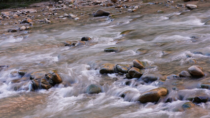River Flowing over Stones