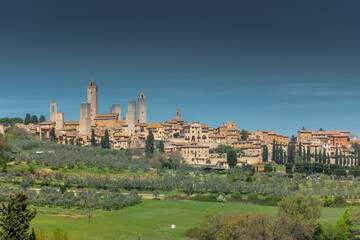 Fototapeta na wymiar Beautiful cityscape with the medieval towers of San Gimignano town in Tuscany, Italy