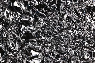 crumpled foil abstract background black and white silver effect