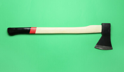 Ax on green background, top view