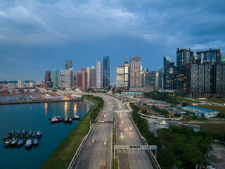 Fototapeta na wymiar Aerial view of Singapore business district and city at twilight in Singapore, Asia..