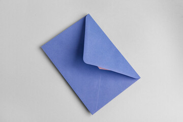 Lilac envelope on grey background