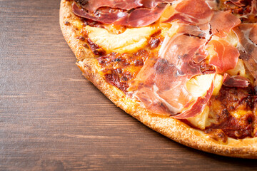 Pizza with prosciutto or parma ham pizza