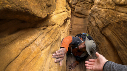 Helping hand climbing out