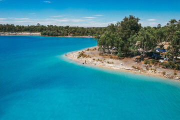 The shoreline of Stockton Lake - one of the bluest lakes in Western Australia and a popular camping location.