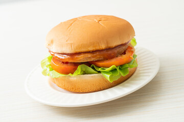 chicken burger with sauce on plate