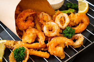deep fried seafood (shrimps and squid) with mix vegetable