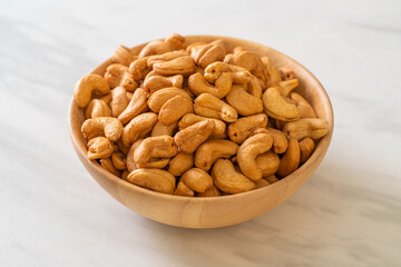 Cashew nuts in wooden bowl