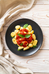 gnocchi in tomato sauce with cheese