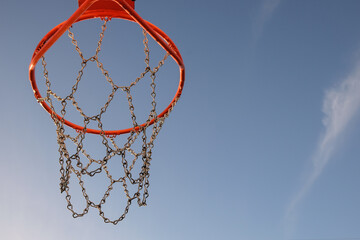 Fototapeta na wymiar Basketball hoop with metal chain and open space