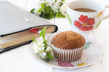 bakery cake with notebook planner, hot coffee arrangement flat lay style on background white 