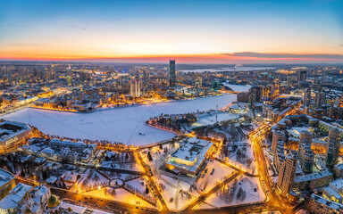 Yekaterinburg aerial panoramic view in Winter at sunset. Ekaterinburg is the fourth largest city in Russia located in the Eurasian continent on the border of Europe and Asia.