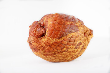 Tasty honey smoked pork ham on white isolated background.