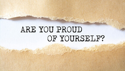 Are You Proud Of Yourself? question written under torn paper.