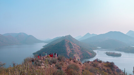 Bahubali Hills, Udaipur, Rajasthan, India 28th December 2022: Popular prewedding destination and trekking spot near Udaipur. 4k Aerial view of Bahubali hill and Badi lake near Barda village