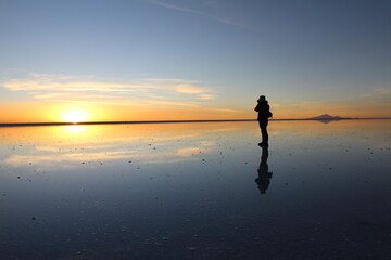 Sunset over Uyuni salt lake in Bolivia