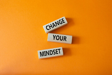 Change your mindset symbol. Concept words Change your mindset on wooden blocks. Beautiful orange background. Business and Change your mindset concept. Copy space.