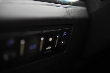The process of choosing climate control in the car. Various controls in auto switches. Modern car...