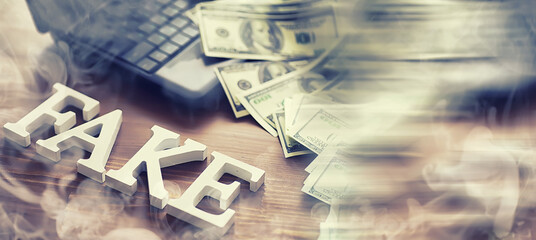 The concept of modern information technology. Fake and facts in the news. The letters spelled the...