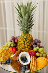 A variety of exotic fruits on a festive table for a banquet.