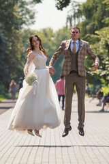 The bride and groom in a wedding dress.