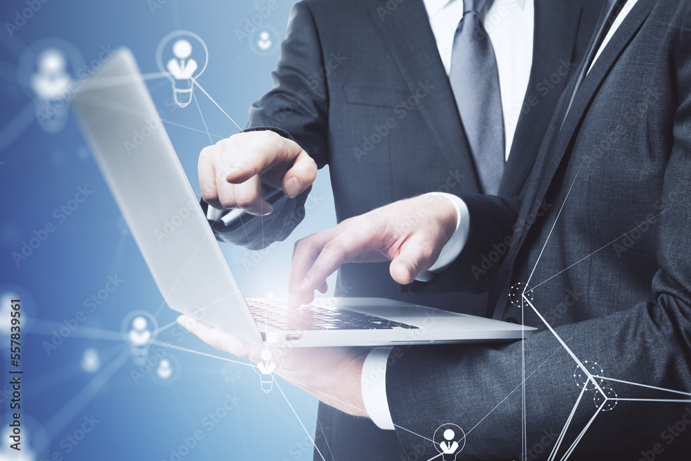 Poster Business communication and social networking concept with two businessman using laptop and digital user symbols connected by lines on blue background