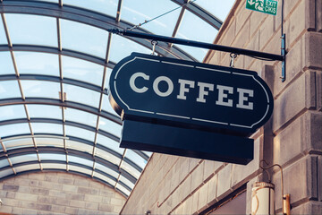 Fototapeta premium Black coffe store signboard in a mall