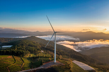 PANORAMIC VIEW OF WIND FARM OR WIND PARK, WITH HIGH WIND TURBINES FOR GENERATION ELECTRICITY WITH...