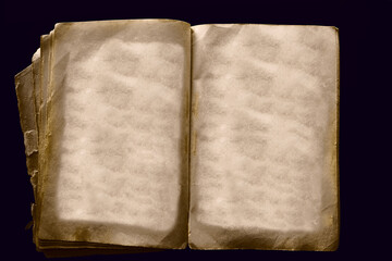 open shabby book with blank sheets. top view image. isolated on black  background. Vintage retro book mock up, open, on the table, with clipping path, empty space, blank paper