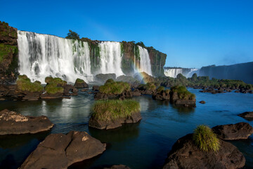 Fototapeta na wymiar A view of one of the many waterfalls on the Brazilian side of Iguazu Falls.