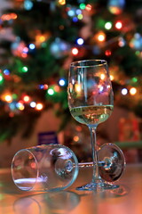 glass of champagne on the background of a Christmas tree