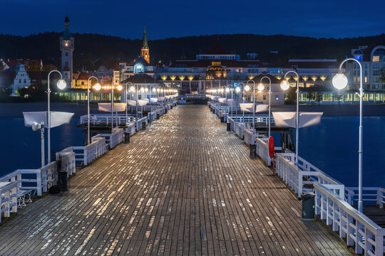 Poland, Pomerania, Sopot, Illuminated Sopot Pier at night
