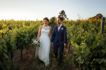 Fototapeten Wedding couple, bride and groom in the vineyards of Rheinhessen © Tobias