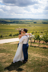 Wedding couple, bride and groom in the vineyards of Rheinhessen