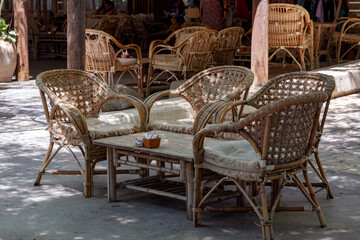 Wooden chairs in the outside garden. Set of luxury wooden garden furniture . Summer concept....