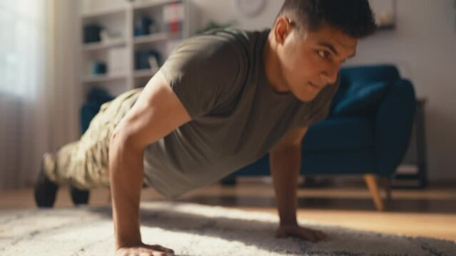 Closeup of soldier doing push up exercises indoors, bodyweight workout, training