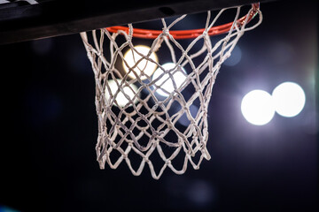 Fototapeta na wymiar basketball game ball in hoop