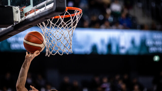 basketball game ball in hoop