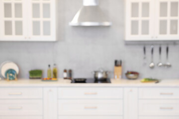 Fototapeta na wymiar Blurred view of modern kitchen. Interior design