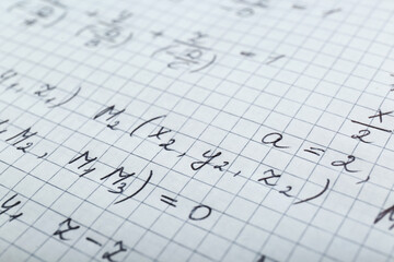 Sheet of paper with different mathematical formulas, closeup