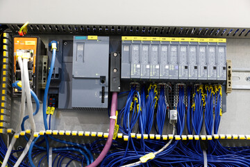 Mecanical equipment. Uninterrupted, electrical voltage. Part on workbench at garage or repair factory station for fix service or maintenance.