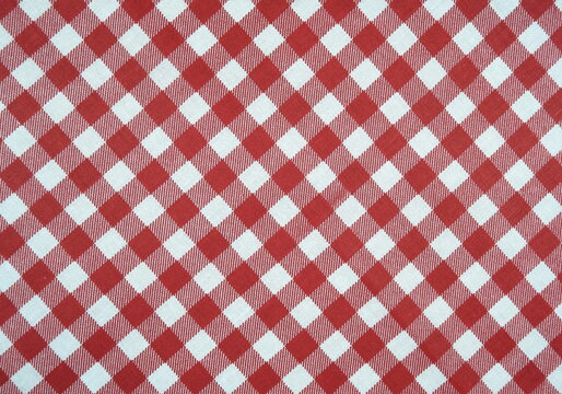 Red White Checkered Classic Pattern Cotton Fabric Background.