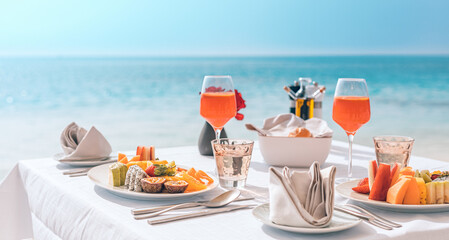 Luxury sunny breakfast table beautiful tropical sea blur. Idyllic romantic morning love couples at summer holiday. Honeymoon romance togetherness vacation concept. Travel lifestyle, destination dining