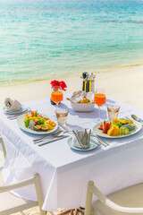Luxury sunny breakfast table beautiful tropical sea blur. Idyllic romantic morning love couples at summer holiday. Honeymoon romance togetherness vacation concept. Travel lifestyle, destination dining