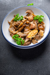 mushroom mix white mushroom, boletus, mushrooms, chanterelles aperitif food marinated snack healthy meal food snack on the table copy space food background rustic top view