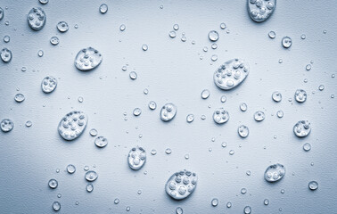 Water drops against bright background, copy space. © malgo_walko