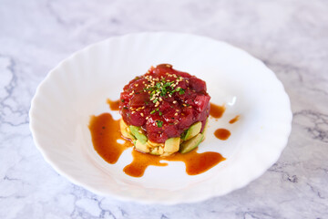 tuna tartare dish with avocado