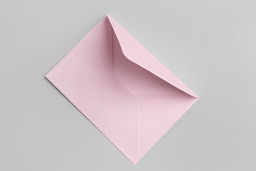 White paper envelope on grey background