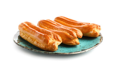 Plate with tasty eclairs on white background
