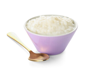 Bowl with delicious rice pudding and spoon on white background
